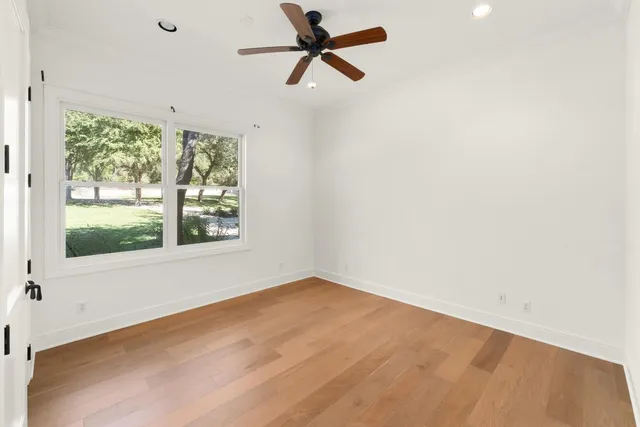 a living room with stainless steel appliances kitchen island granite countertop furniture and a window
