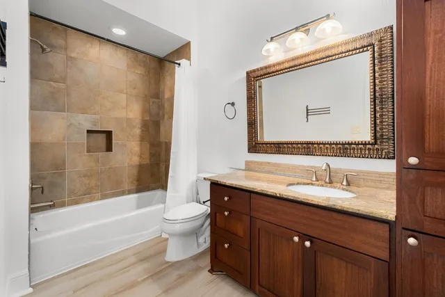 a view of a swimming pool with an outdoor seating and a yard