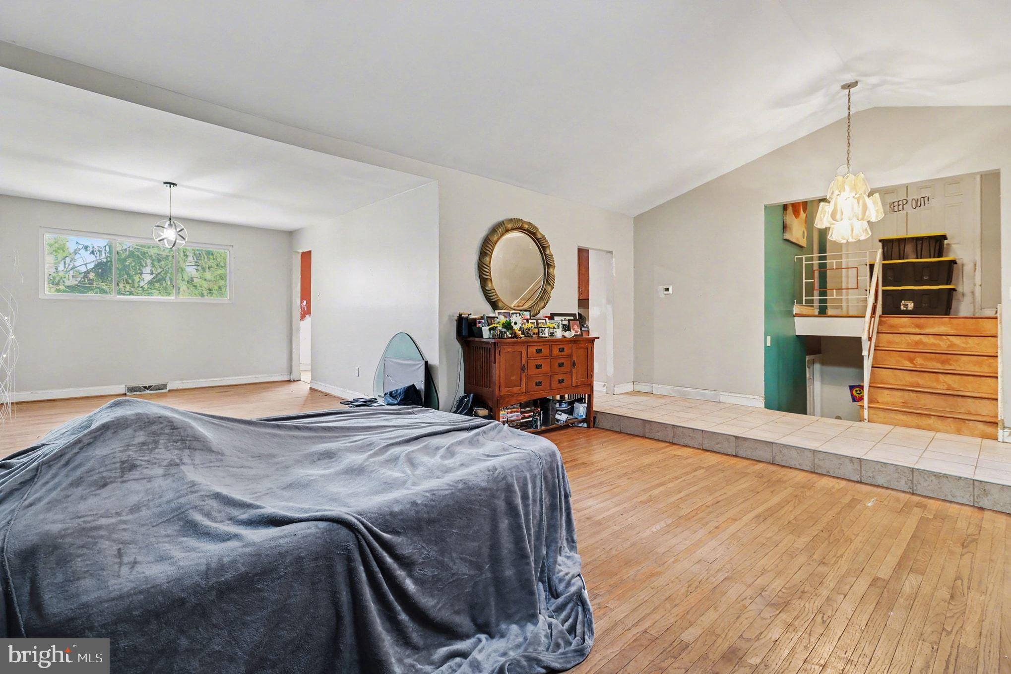 2338 Fairway Road Huntingdon Valley, PA 19006 - Photo 12 of 27 a bedroom with a bed window and a wooden floor