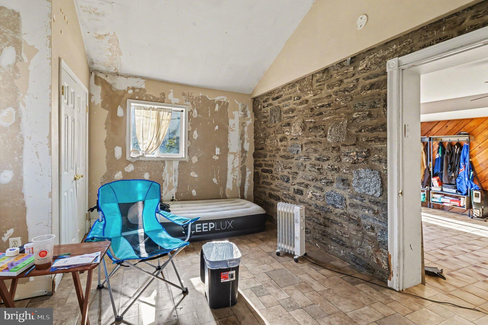 2338 Fairway Road Huntingdon Valley, PA 19006 - Photo 24 of 27 a living room with furniture and a window