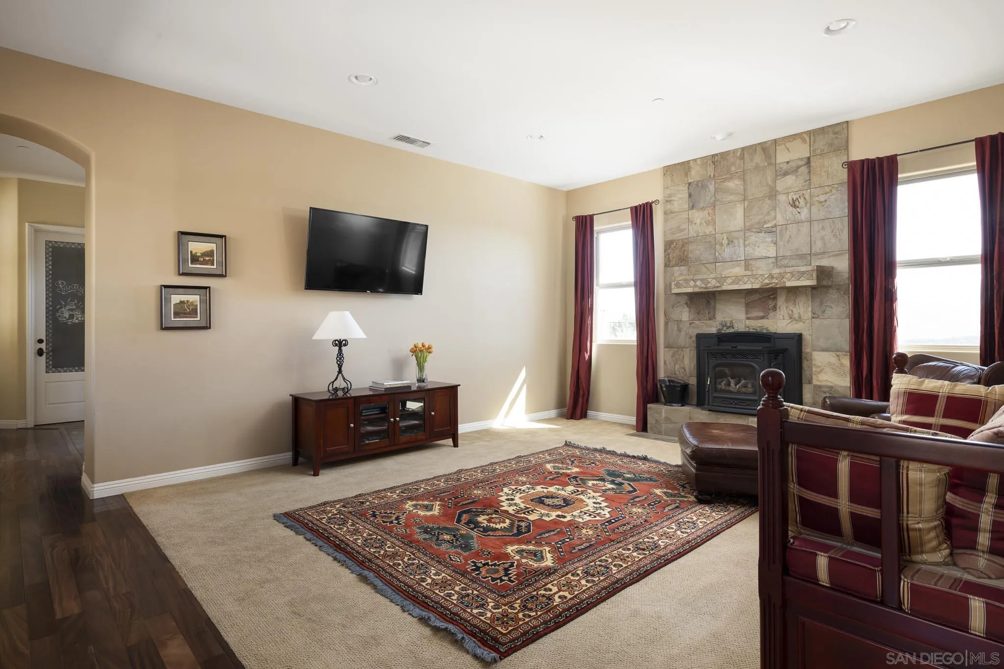 2001 Corte Sierra Alpine, CA 91901 - Photo 11 of 35 a living room with furniture and a flat screen tv