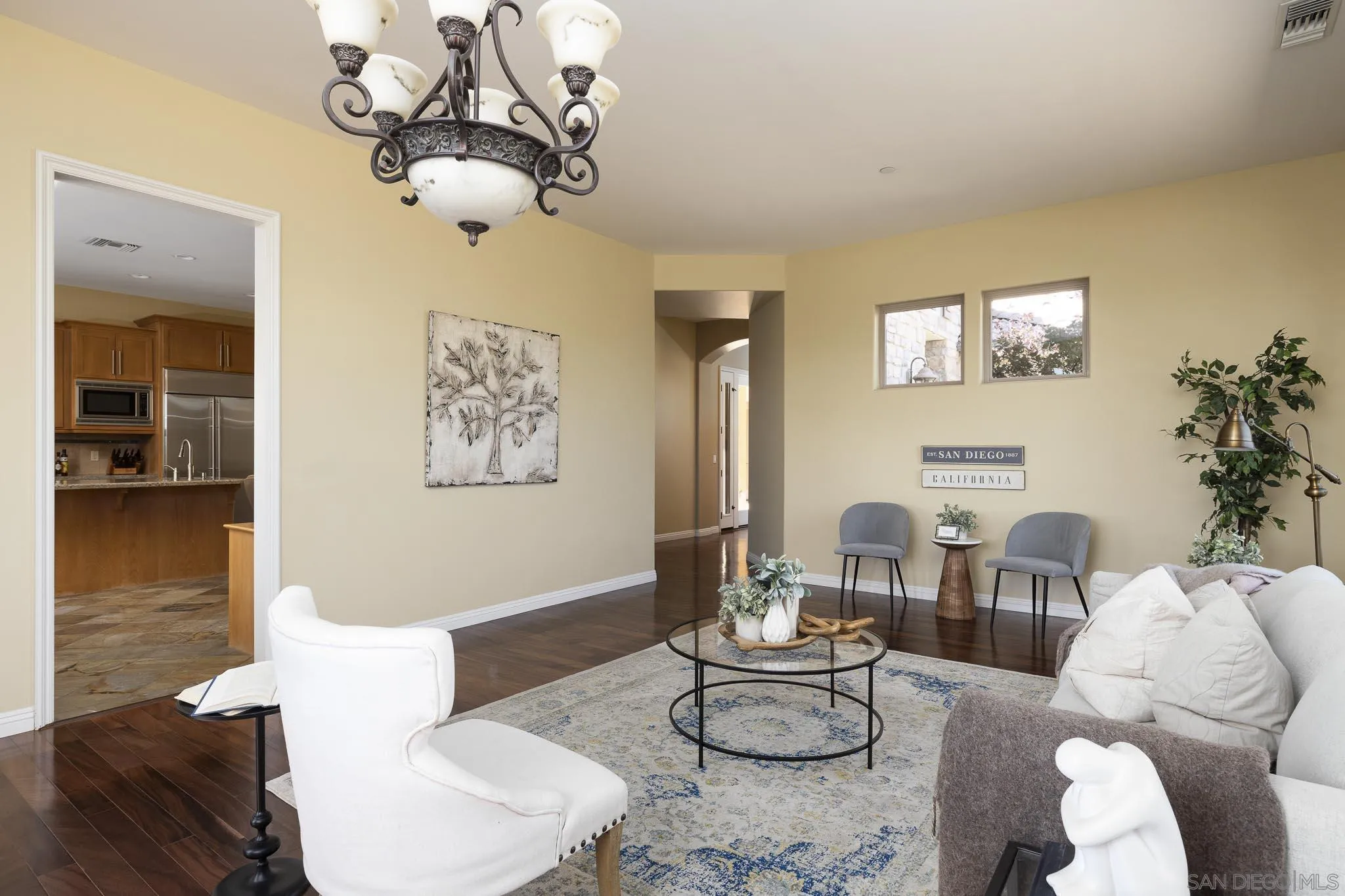2001 Corte Sierra Alpine, CA 91901 - Photo 13 of 35 a living room with furniture chandelier and a dining table