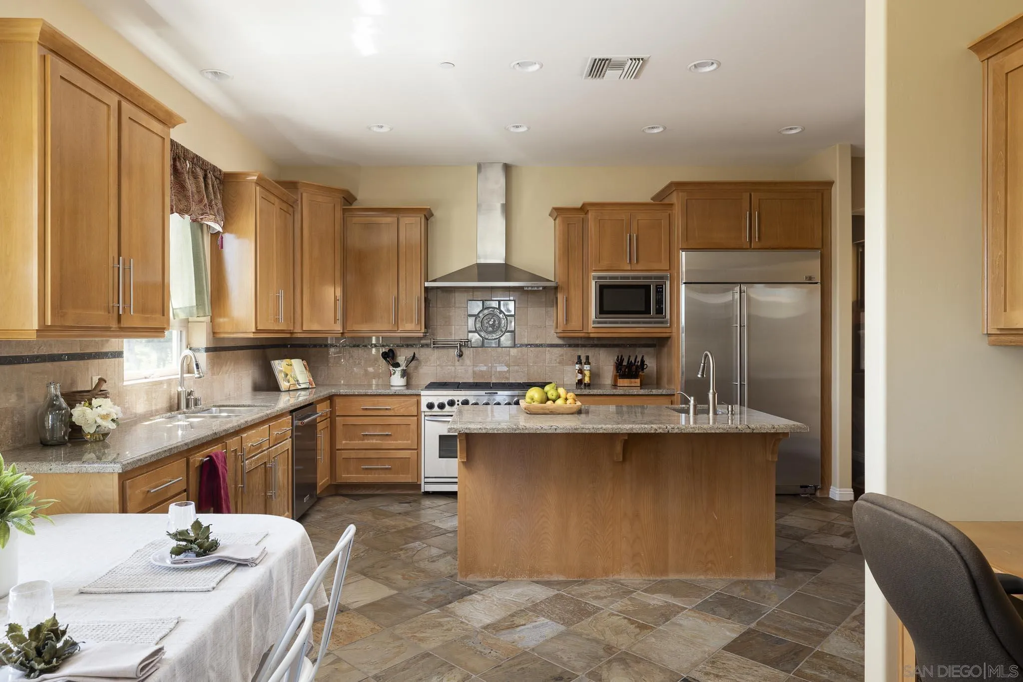 2001 Corte Sierra Alpine, CA 91901 - Photo 14 of 35 a kitchen with cabinets a sink and appliances