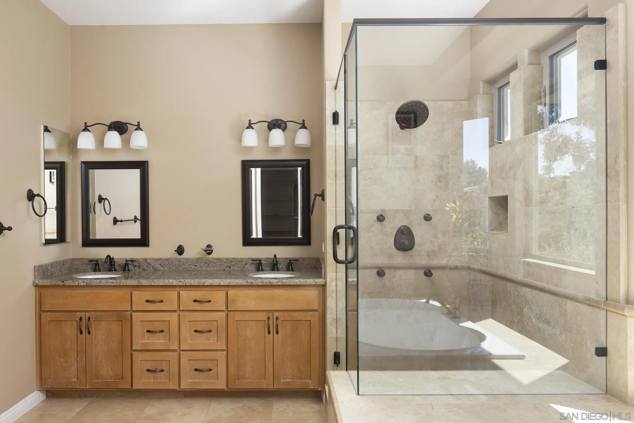2001 Corte Sierra Alpine, CA 91901 - Photo 20 of 35 a bathroom with a granite countertop sink mirror and a shower