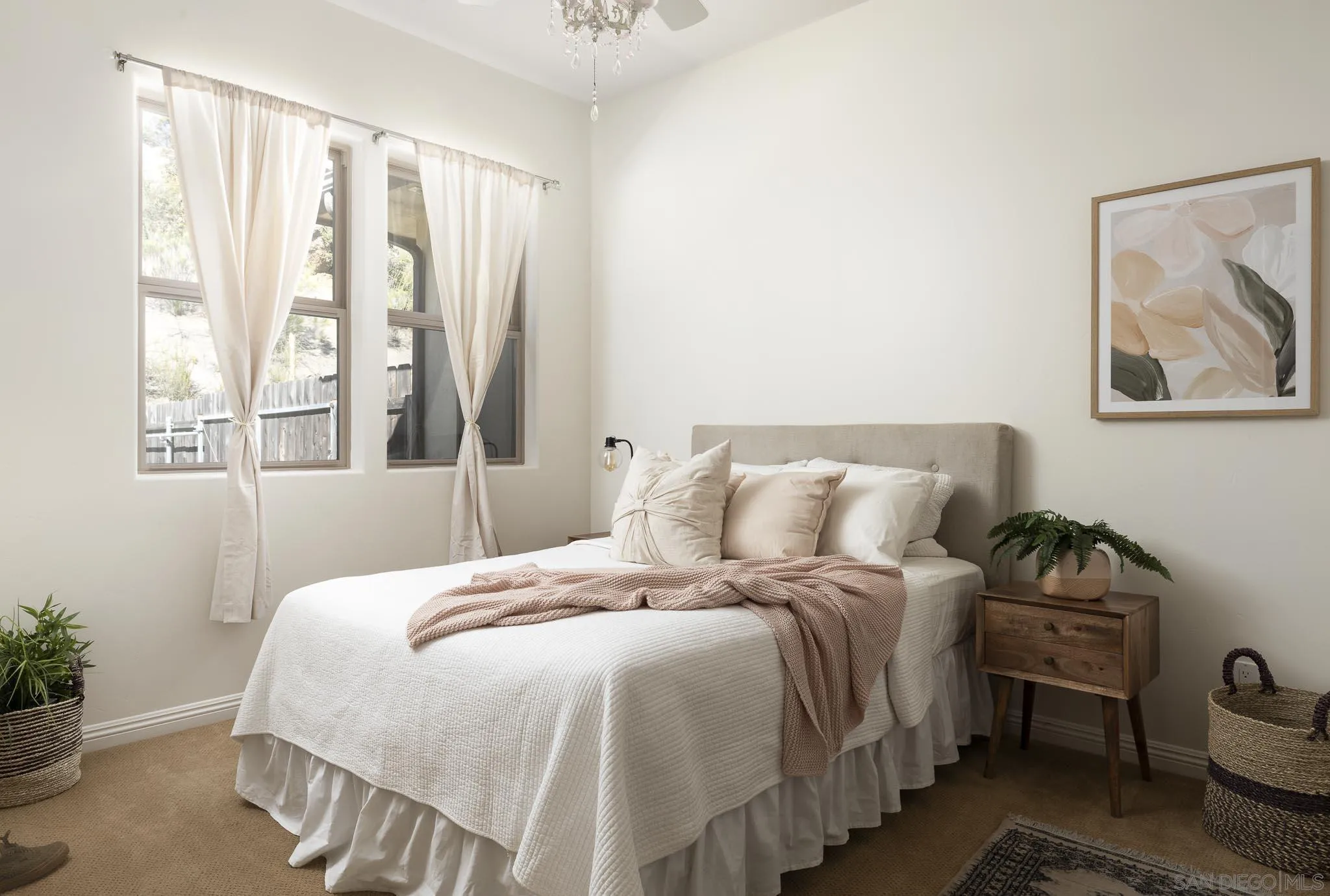 2001 Corte Sierra Alpine, CA 91901 - Photo 22 of 35 a bedroom with a bed and a painting on the wall