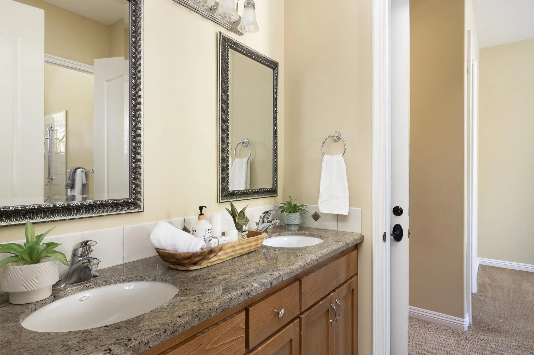2001 Corte Sierra Alpine, CA 91901 - Photo 23 of 35 a bathroom with a granite countertop sink and a mirror