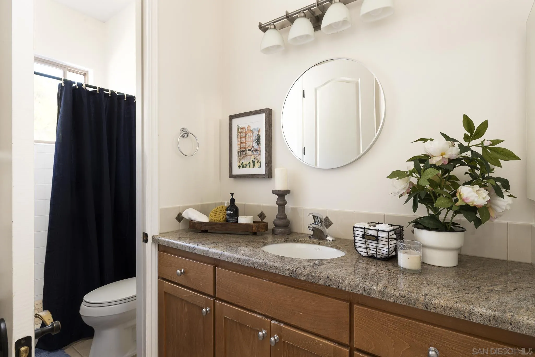 2001 Corte Sierra Alpine, CA 91901 - Photo 27 of 35 a bathroom with a granite countertop sink and a mirror