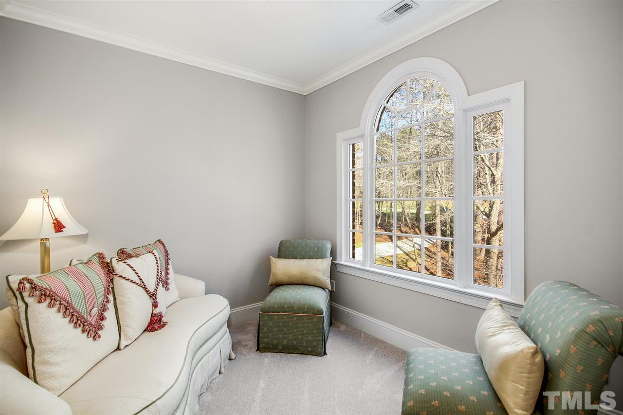 1504 Tradescant Court Raleigh, NC 27613 - Photo 14 of 30 a living room with furniture and a large window