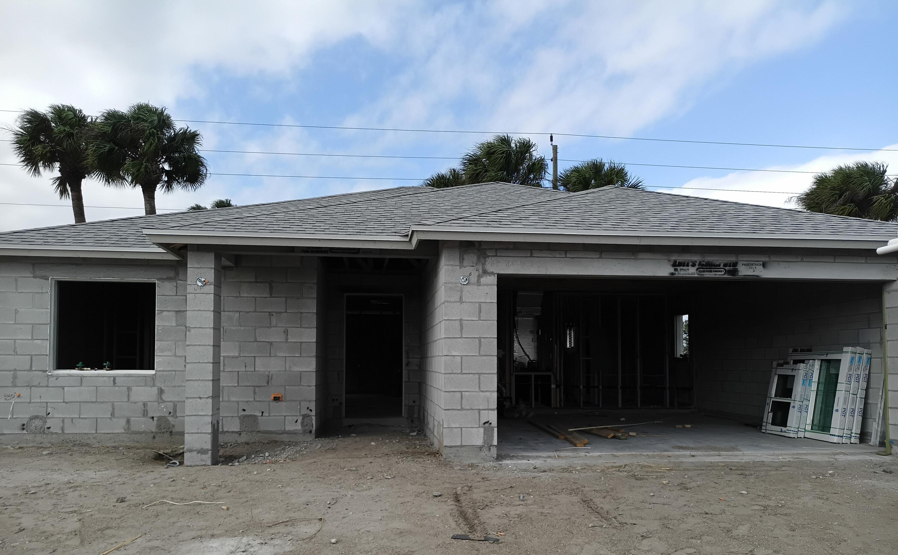 4335 Southwest 15th Way Okeechobee, FL 34974 - Photo 13 of 14 a view of a entryway door front of house