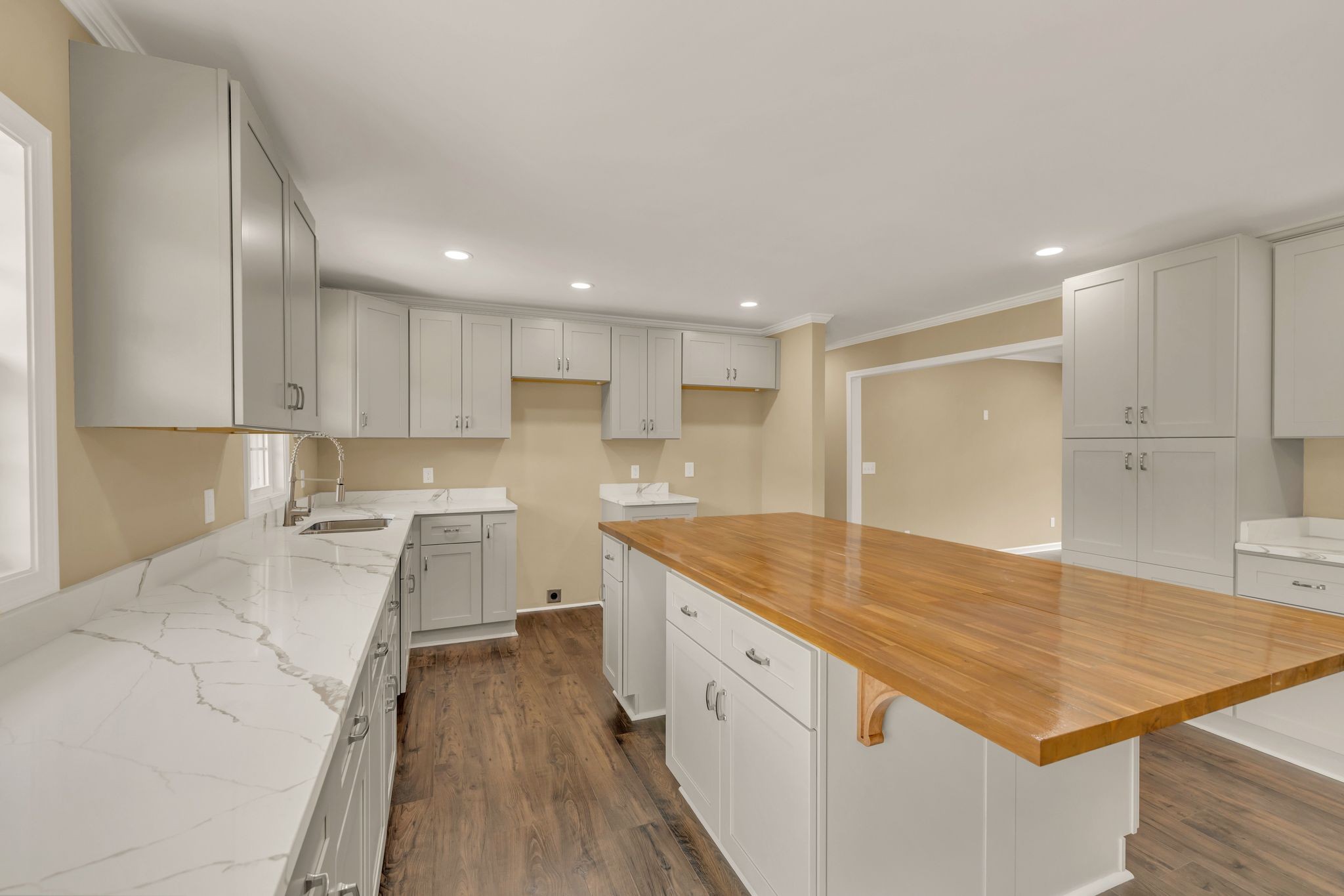 5065 Craddock Road Lascassas, TN 37085 - Photo 15 of 51 a kitchen with a sink stove and cabinets