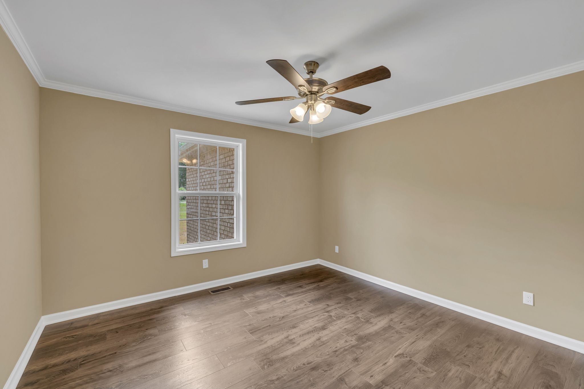 5065 Craddock Road Lascassas, TN 37085 - Photo 28 of 51 a view of empty room with wooden floor and fan