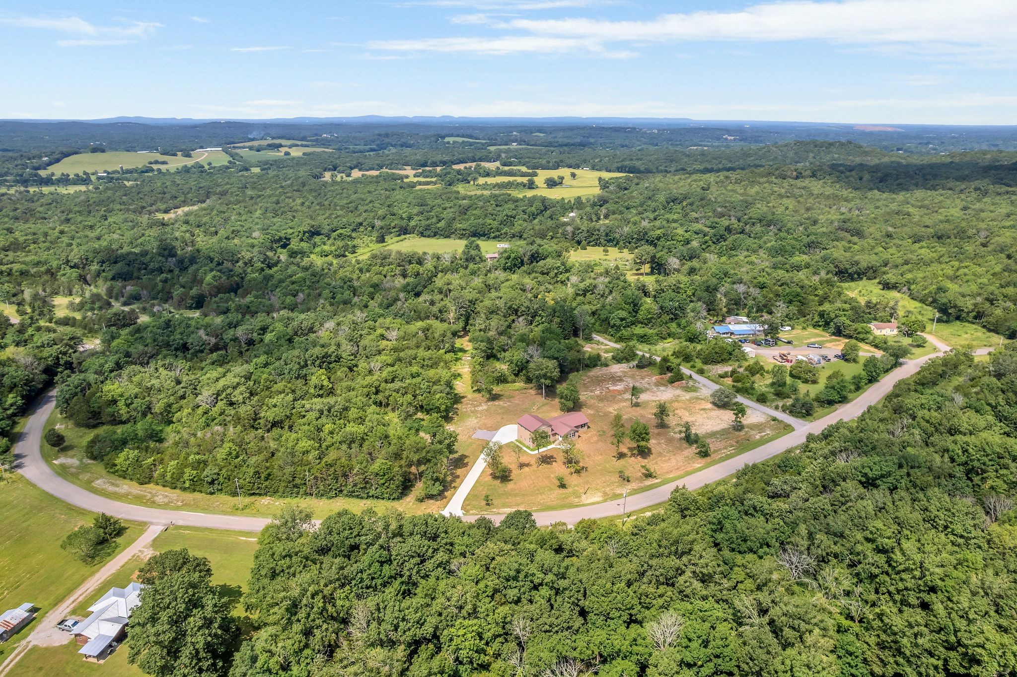 5065 Craddock Road Lascassas, TN 37085 - Photo 39 of 51 a view of a green yard with large trees