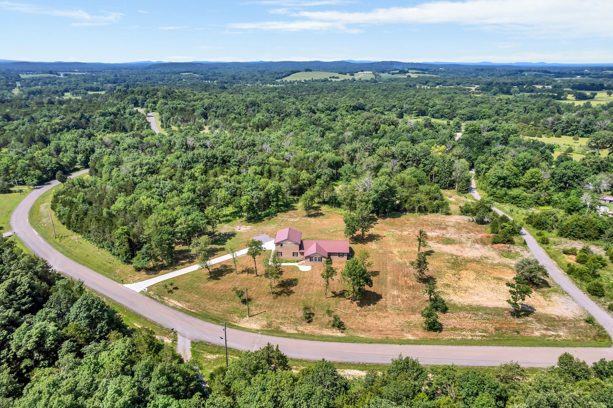 5065 Craddock Road Lascassas, TN 37085 - Photo 41 of 51 a view of a lake with a mountain