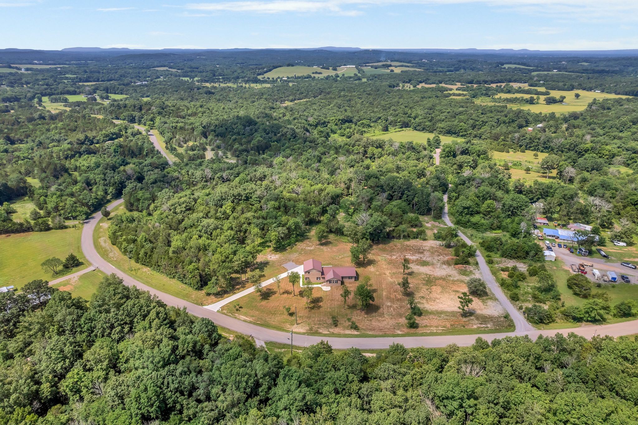 5065 Craddock Road Lascassas, TN 37085 - Photo 43 of 51 a view of a lake with a mountain