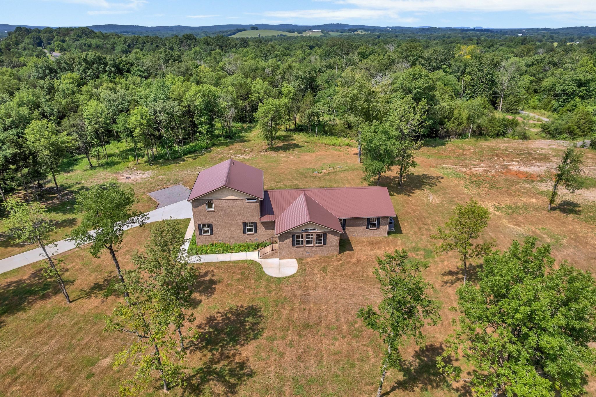 5065 Craddock Road Lascassas, TN 37085 - Photo 44 of 51 an aerial view of a house with yard