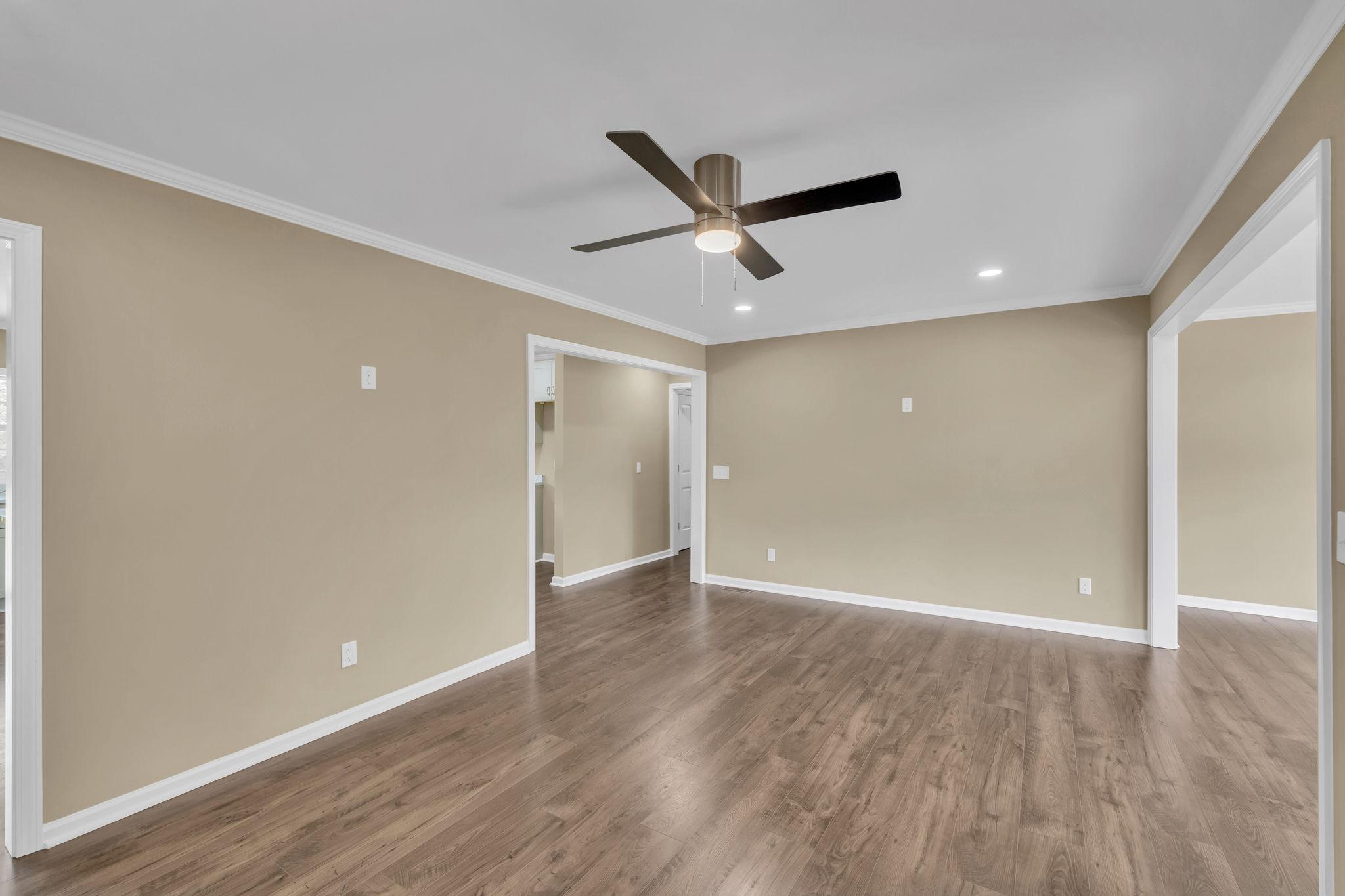 5065 Craddock Road Lascassas, TN 37085 - Photo 10 of 51 an empty room with wooden floor and windows