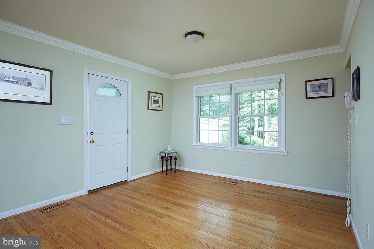 13822 Leibig Road Silver Spring, MD 20904 - Photo 5 of 30 The door on the left leads to the carport.