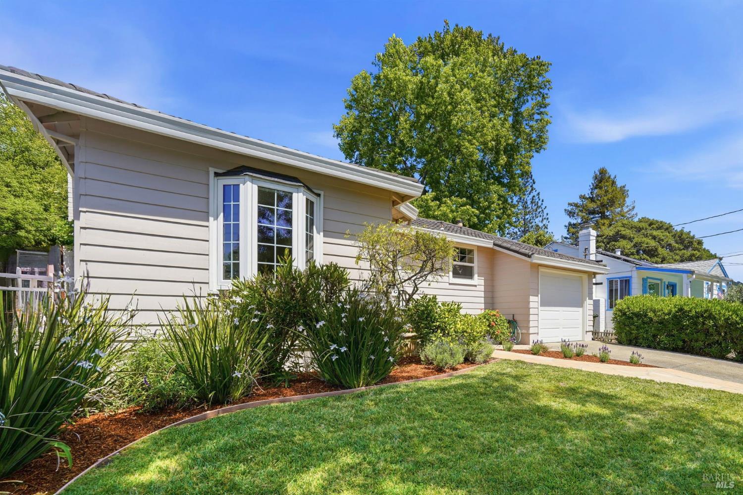 234 Solano Street San Rafael, CA 94901 - Photo 2 of 24 a front view of a house with a yard