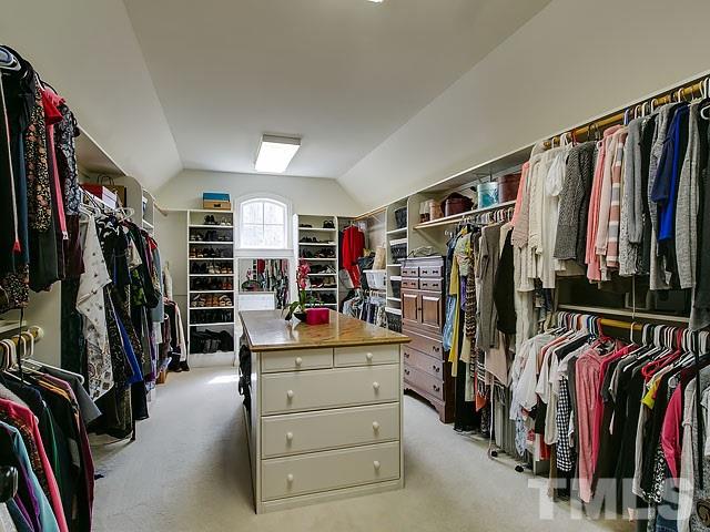 6037 Over Hadden Court Raleigh, NC 27614 - Photo 20 of 25 a view of walk in closet with clothes