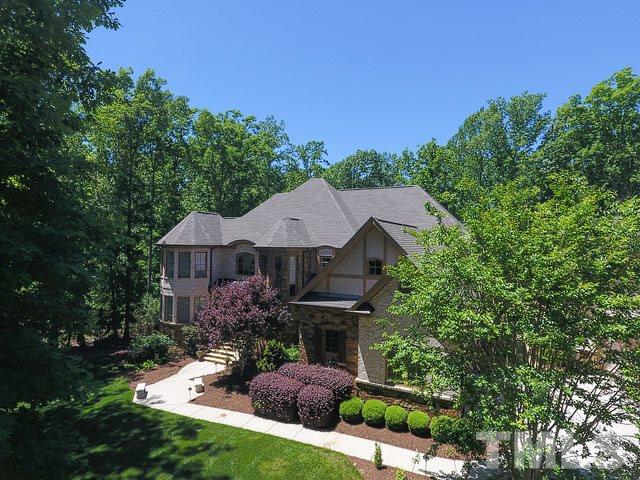 6037 Over Hadden Court Raleigh, NC 27614 - Photo 24 of 25 a view of a house with yard and garden