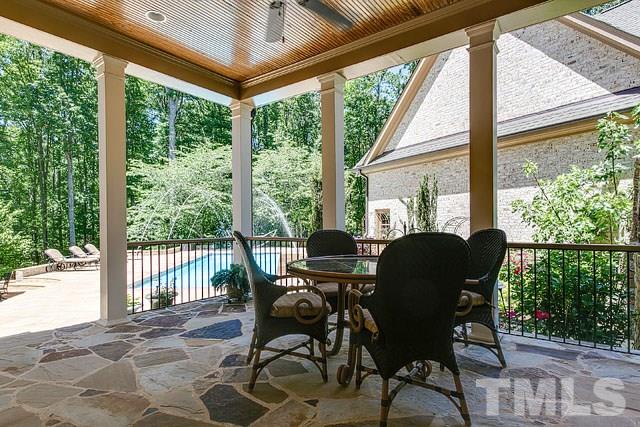 6037 Over Hadden Court Raleigh, NC 27614 - Photo 4 of 25 a view of a dining room with furniture window and outside view