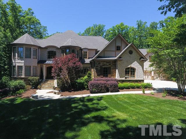 6037 Over Hadden Court Raleigh, NC 27614 - Photo 6 of 25 a front view of a house with a garden