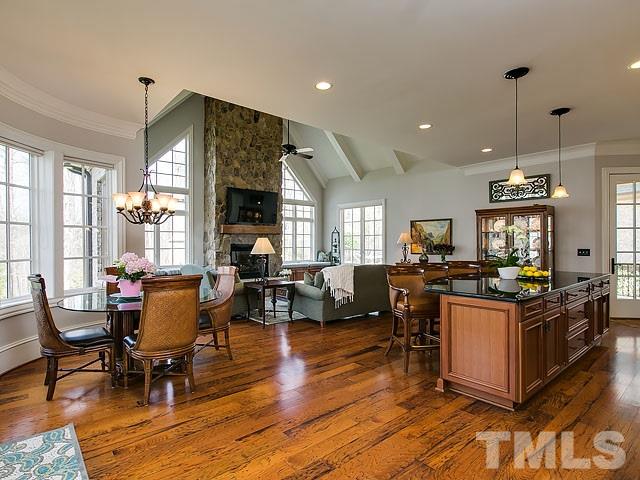 6037 Over Hadden Court Raleigh, NC 27614 - Photo 9 of 25 a view of a dining room with furniture window and wooden floor