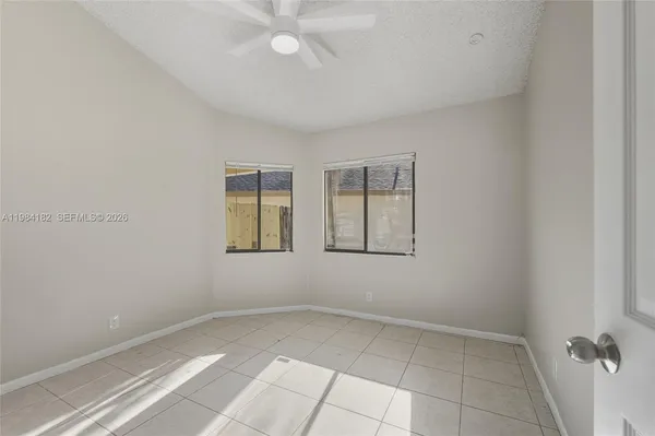 an empty room with windows