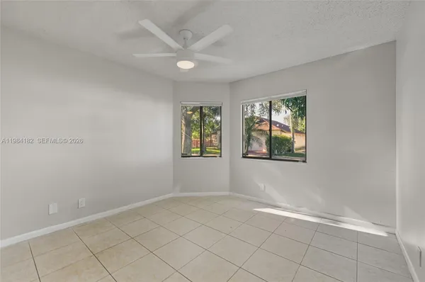 an empty room with windows