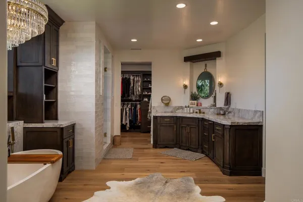 a kitchen with a sink and a stove top oven