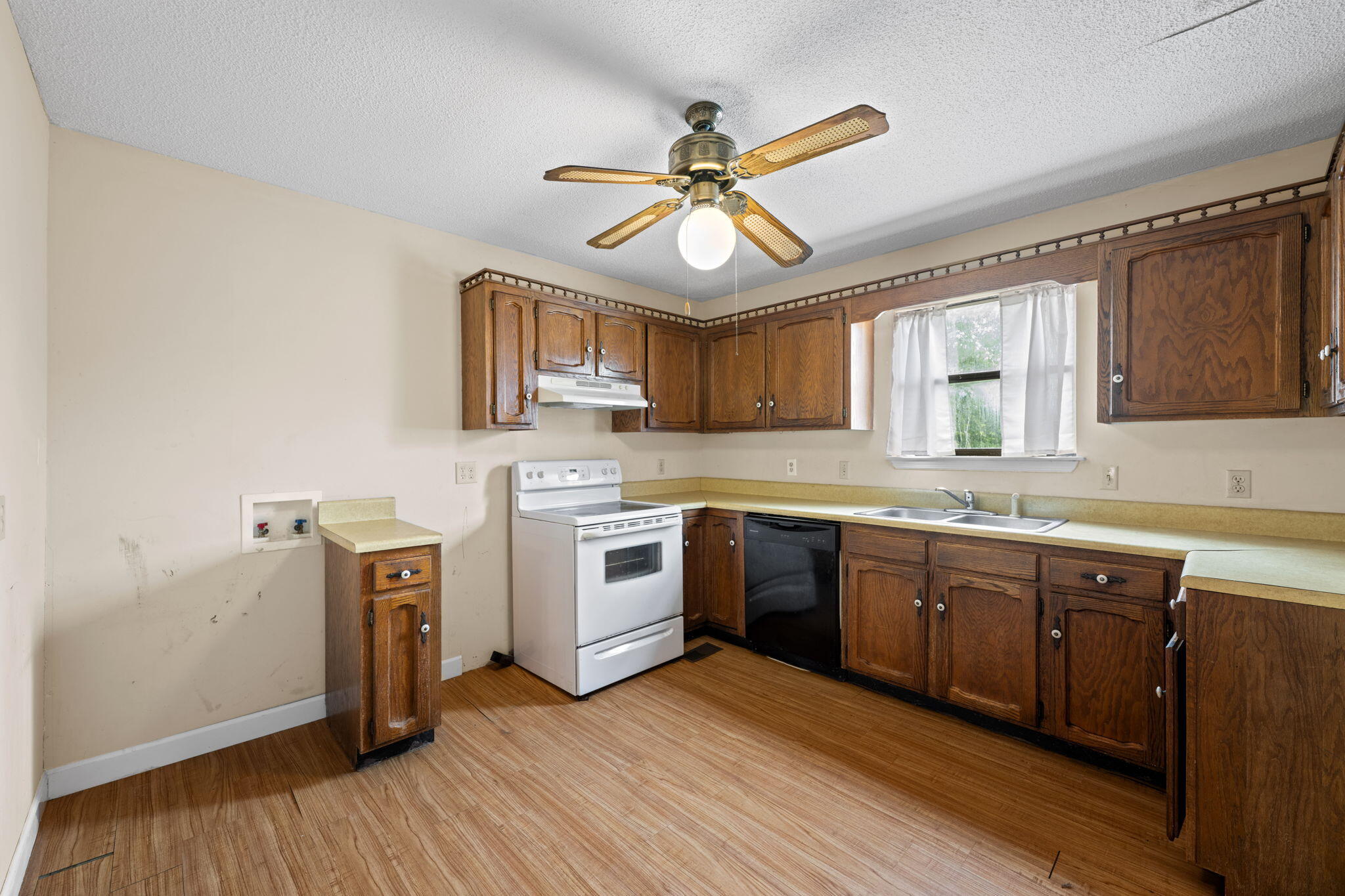 5642 Tucker Road Ooltewah, TN 37363 - Photo 14 of 52 washer dryer hook-up in kitchen 1 of 2