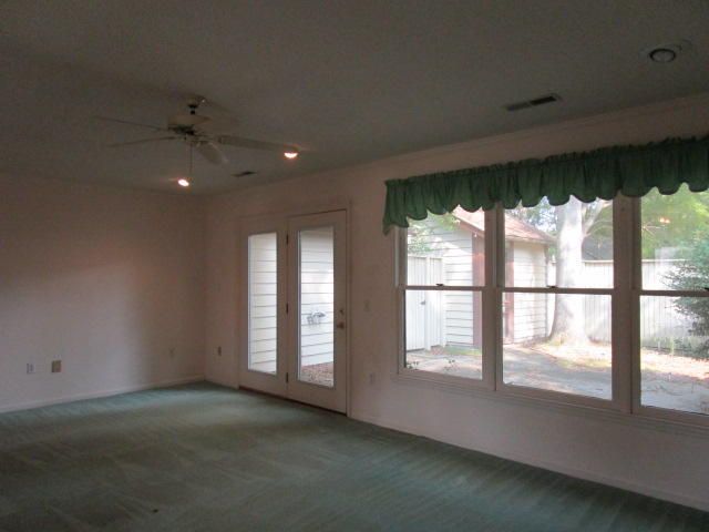 12 Peter Collinson Road Santee, SC 29142 - Photo 3 of 9 Living Area Leading to Courtyard with St