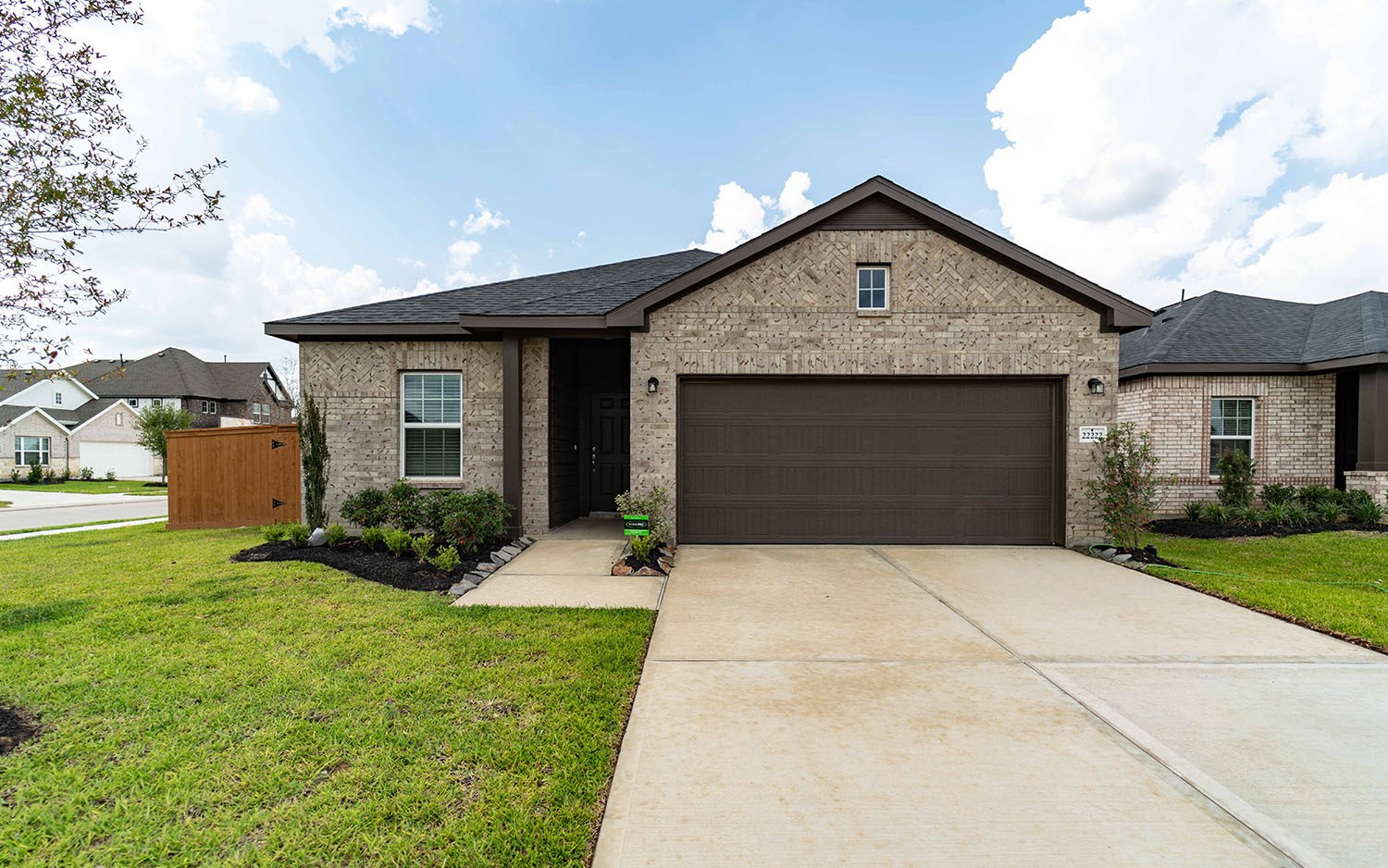 22222 Rome Breeze Drive Hockley, TX 77447 - Photo 1 of 16 a front view of house with yard and green space