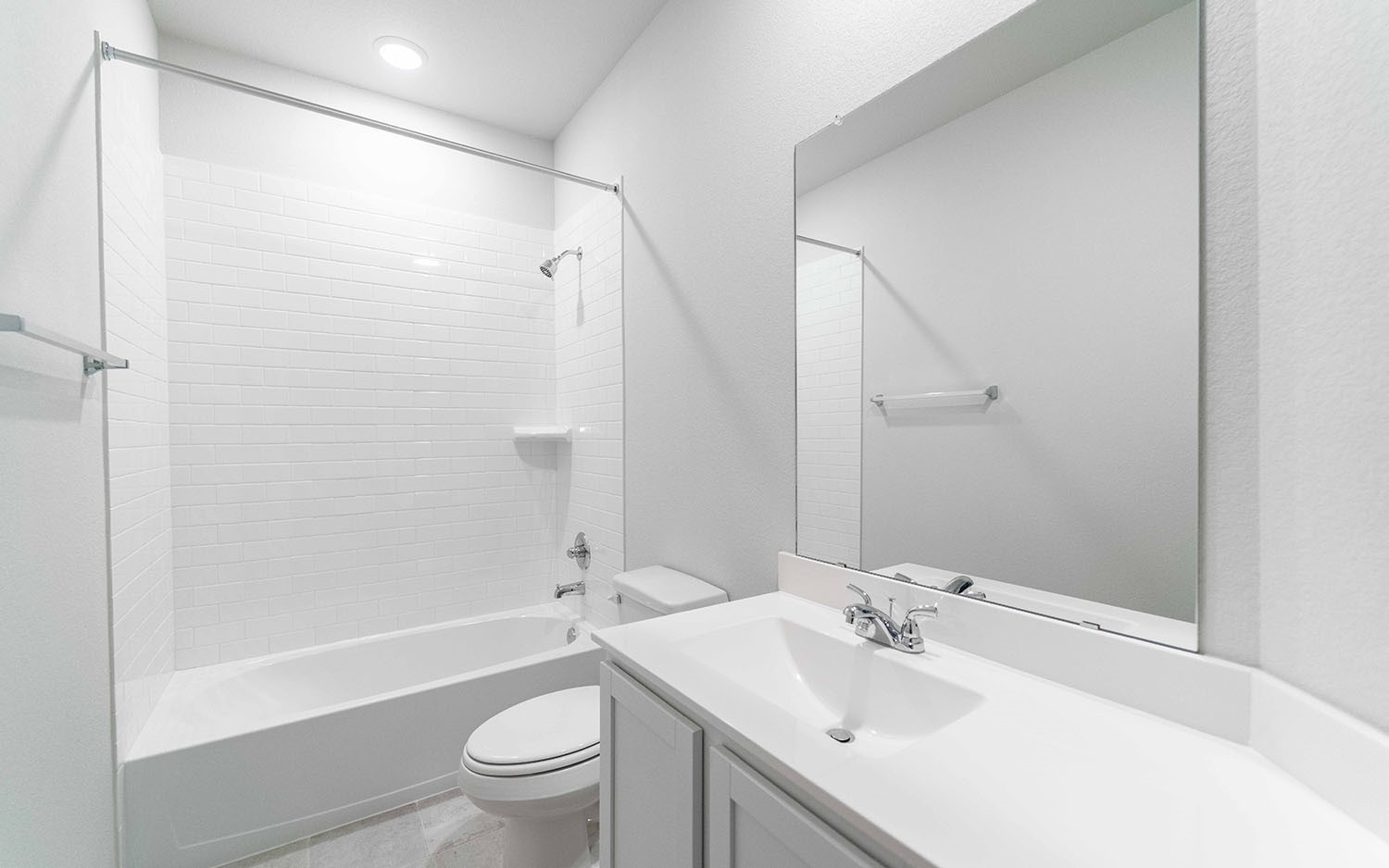 22222 Rome Breeze Drive Hockley, TX 77447 - Photo 13 of 16 a bathroom with a sink a toilet and shower