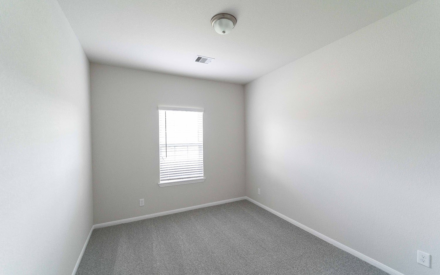22222 Rome Breeze Drive Hockley, TX 77447 - Photo 14 of 16 an empty room with a window