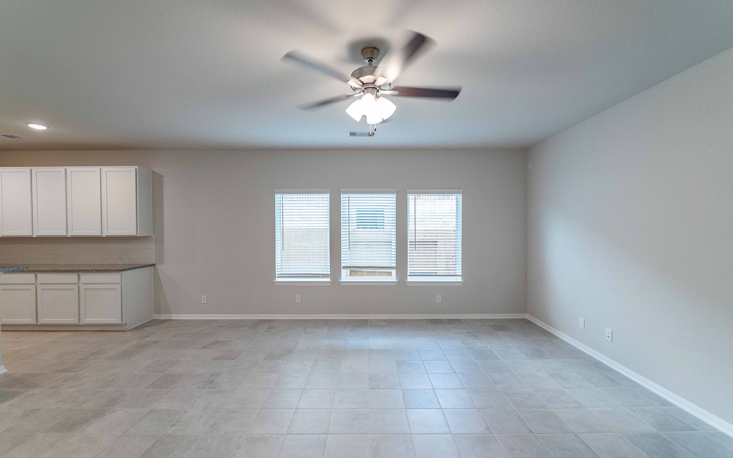 22222 Rome Breeze Drive Hockley, TX 77447 - Photo 4 of 16 a view of an empty room with a window
