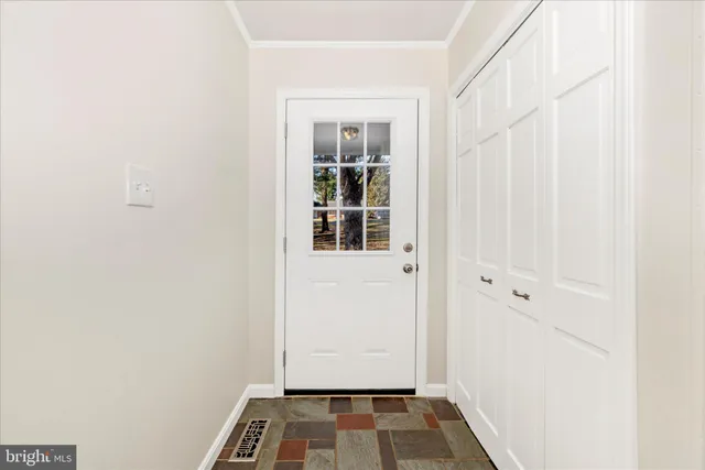 a view of walk in closet with window