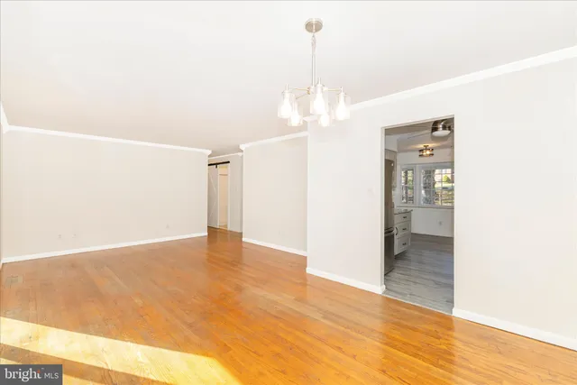 a view of a livingroom with wooden floor