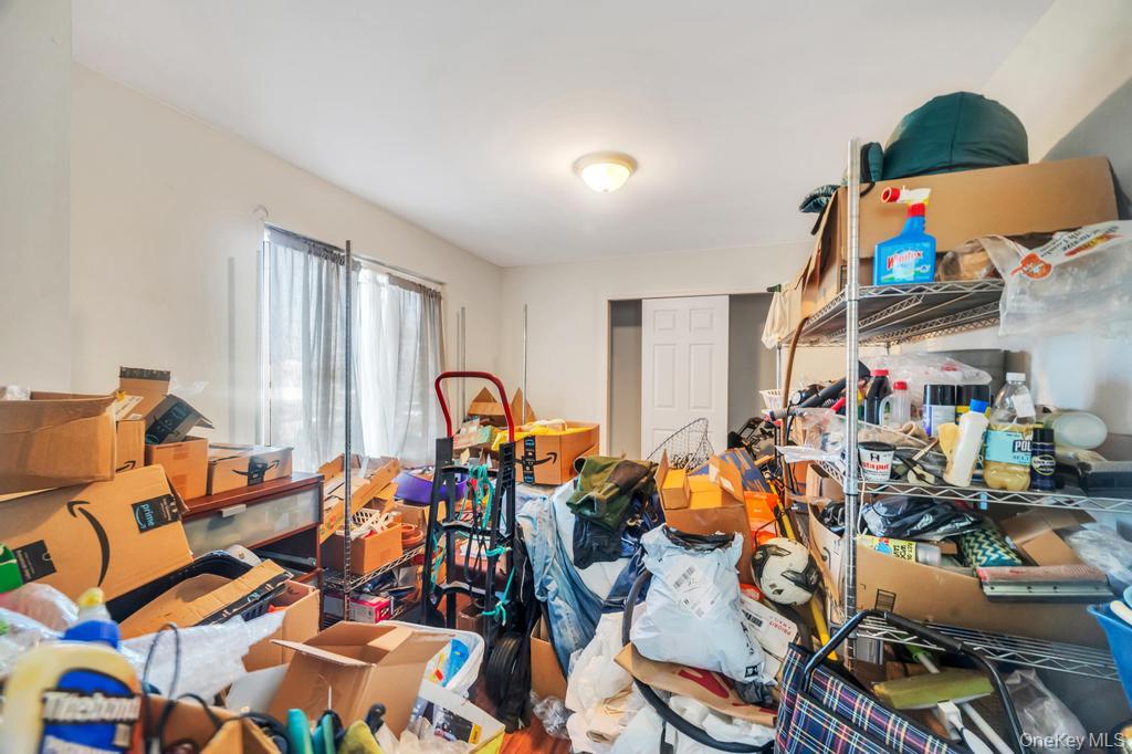 3142 Shore Road Bellmore, NY 11710 - Photo 11 of 24 a very nice looking room with many windows and plants