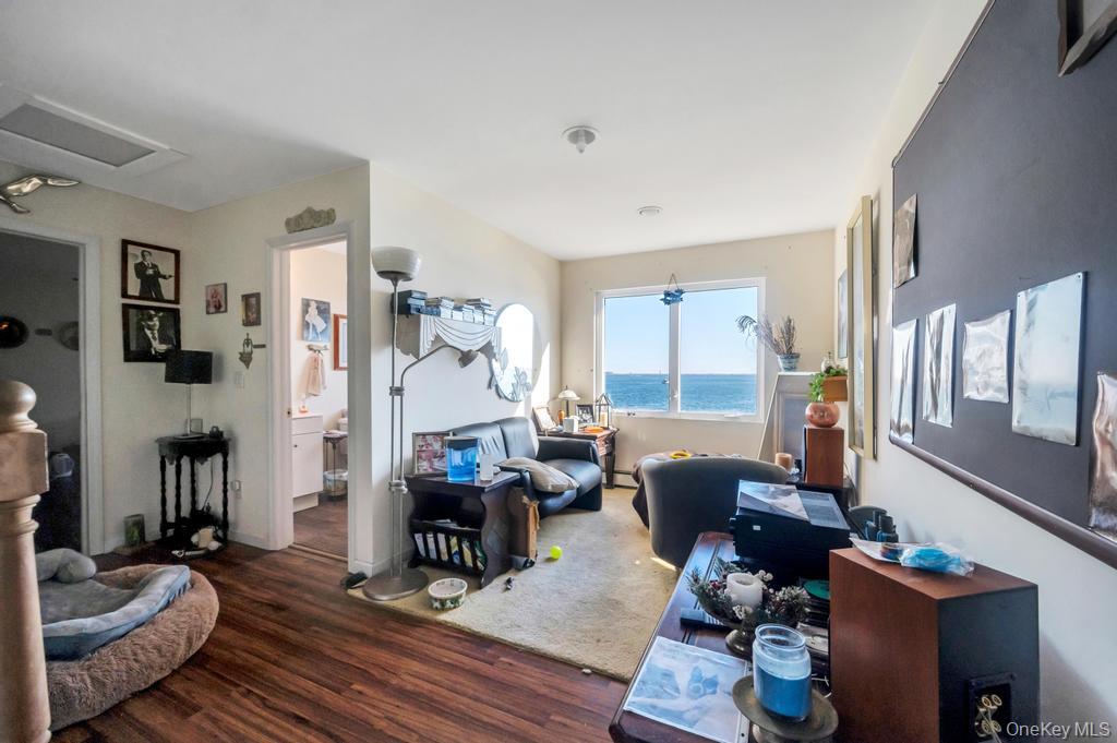 3142 Shore Road Bellmore, NY 11710 - Photo 14 of 24 a living room with furniture and wooden floor