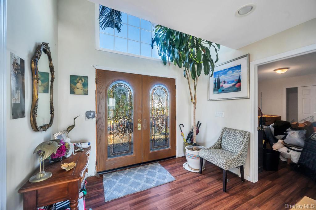 3142 Shore Road Bellmore, NY 11710 - Photo 2 of 24 a living room with furniture and wooden floor