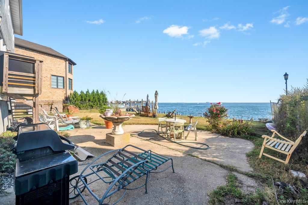 3142 Shore Road Bellmore, NY 11710 - Photo 23 of 24 a view of swimming pool with outdoor seating and city view