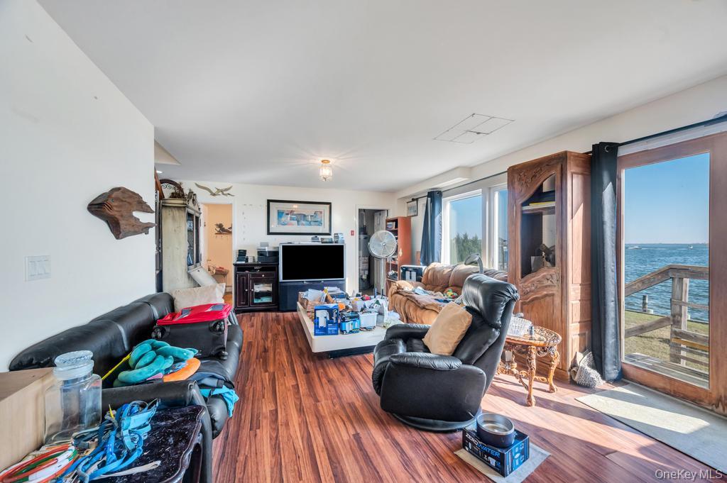 3142 Shore Road Bellmore, NY 11710 - Photo 3 of 24 a living room with furniture and a wooden floor