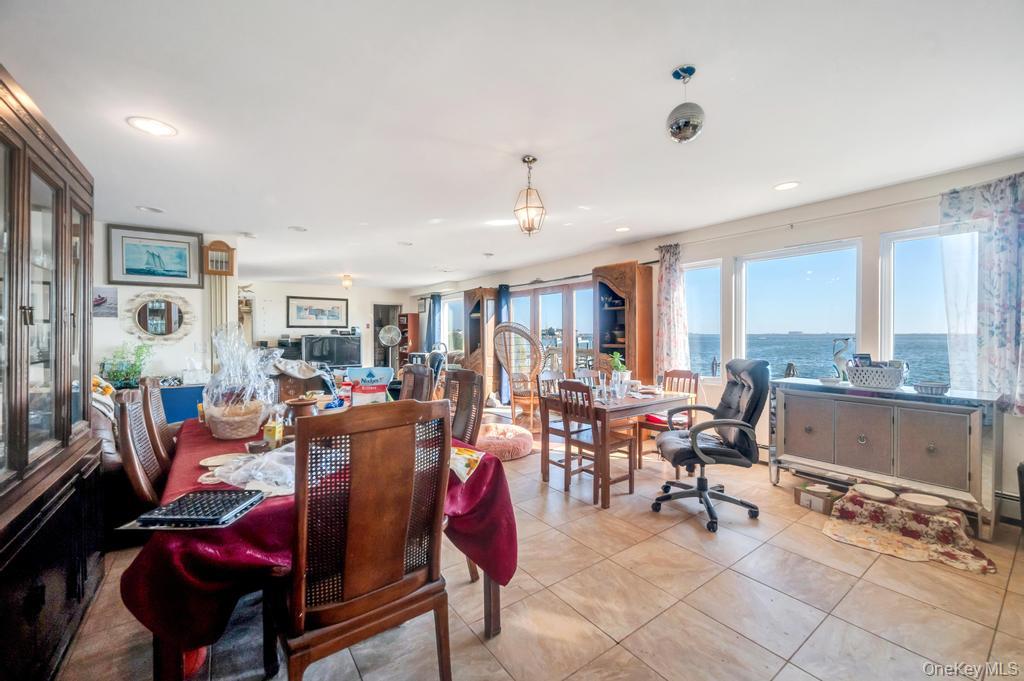 3142 Shore Road Bellmore, NY 11710 - Photo 8 of 24 a living room with furniture and a large window