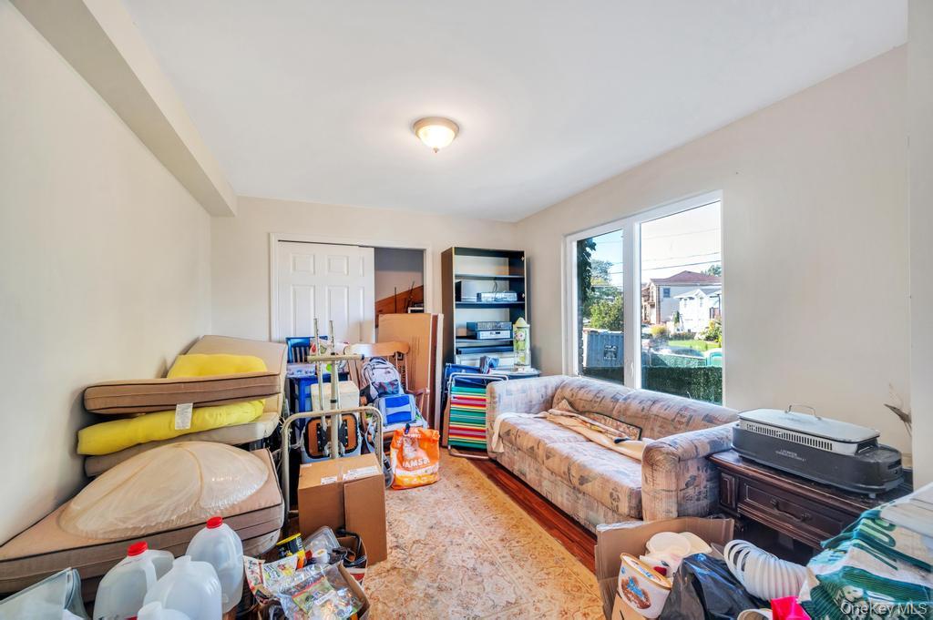 3142 Shore Road Bellmore, NY 11710 - Photo 10 of 24 a living room with furniture and wooden floor