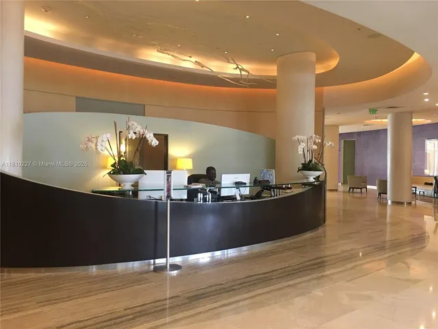 a view of a living room and kitchen