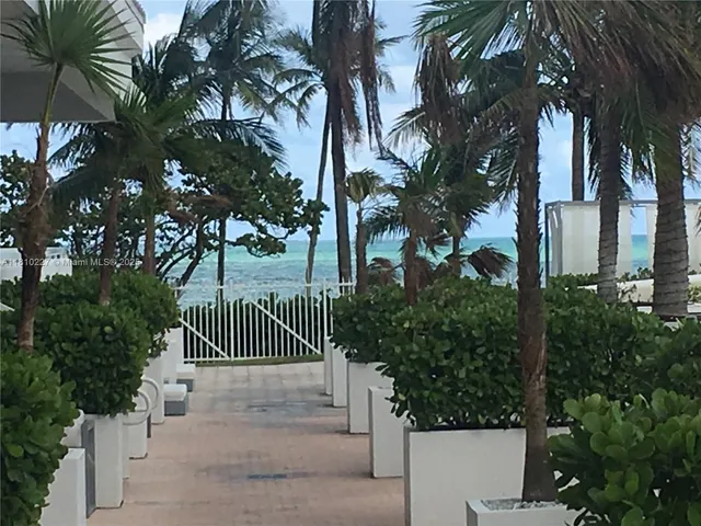 a view of statue in a garden
