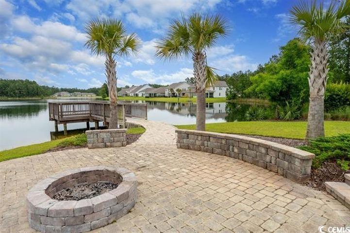 1221 Wind Swept Court Little River, SC 29566 - Photo 23 of 29 Exterior space with a yard, a water view, a patio,
