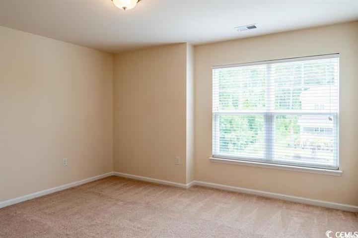 1221 Wind Swept Court Little River, SC 29566 - Photo 28 of 29 View of carpeted empty room