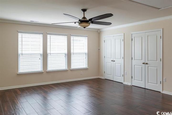 1221 Wind Swept Court Little River, SC 29566 - Photo 10 of 29 Unfurnished bedroom featuring ceiling fan, ornamen